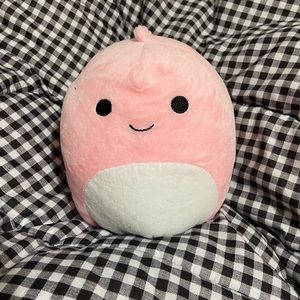 Pink dinosaur squishmallow